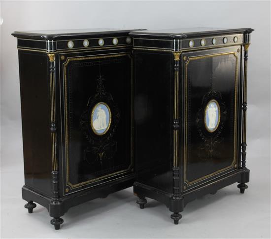 A pair of Victorian ebonised pier cabinets, W.2ft 8in. D.1ft 5in. H.3ft 10in.